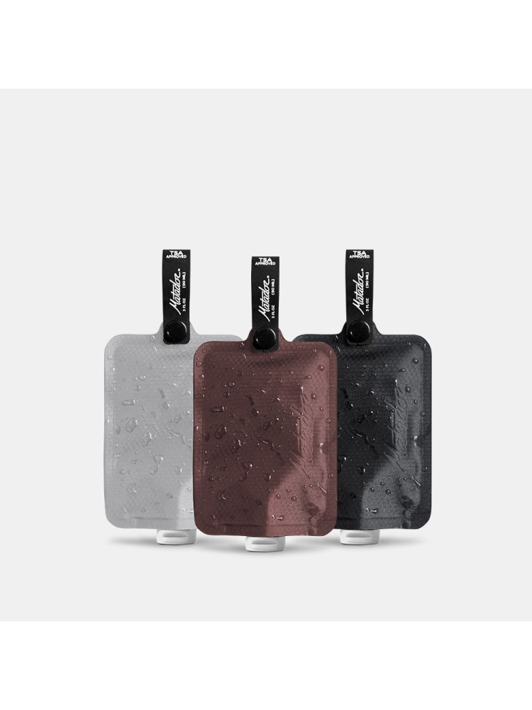 Matador Matador FlatPak Toiletry Bottle 3-Pack Charcoal, White, Garnet MATFPB3001MLT2 toiletartikelen online bestellen bij Kathmandu Outdoor & Travel